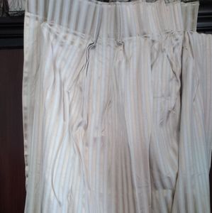 Pleated curtains in excellent condition.